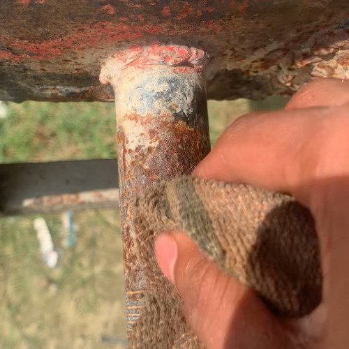 Rusted iron tank pipe cleaning