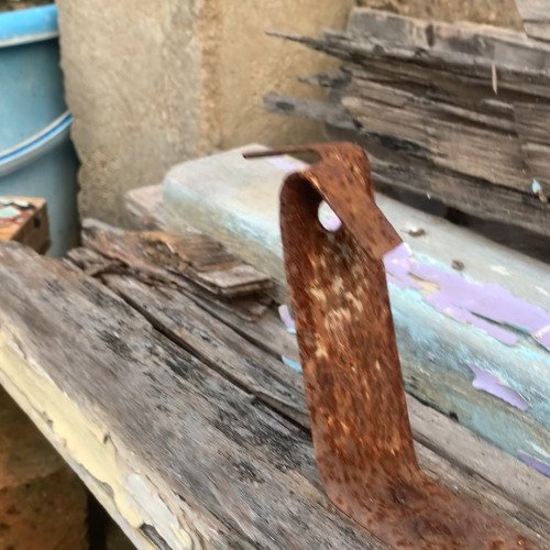 Iron sheet on wooden door cleaner