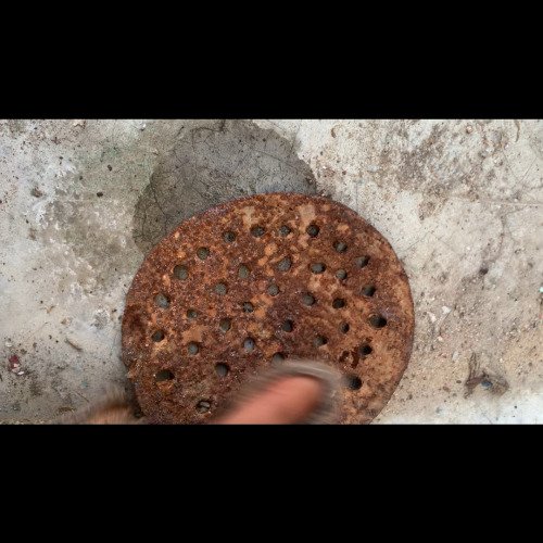 Cleaning old rusted ladle