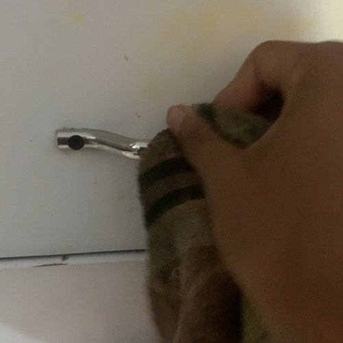 Cleaning handle from almirah