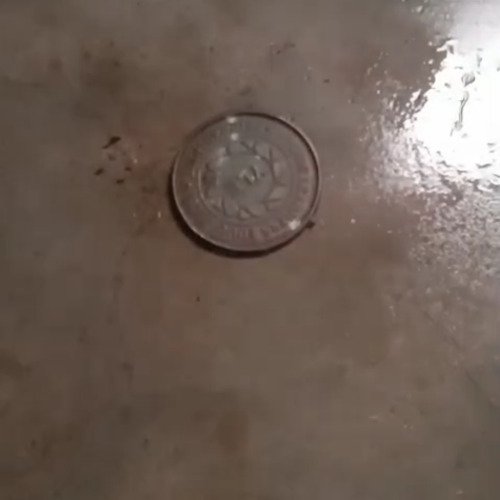 Cleaning old coin