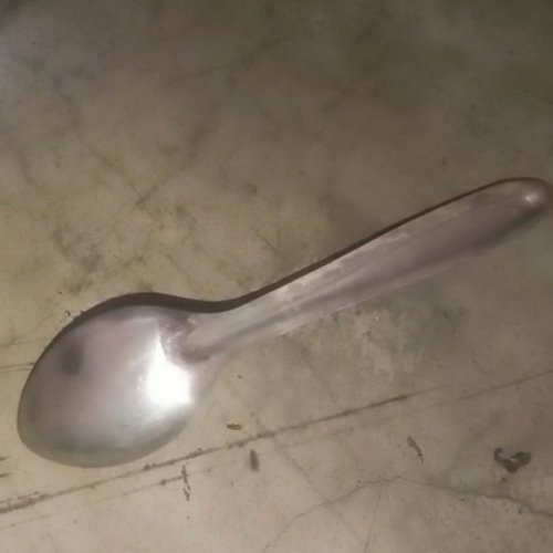 Cleaning dirty spoon