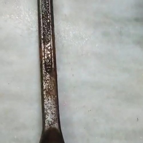 Broken rusted wrench cleaning