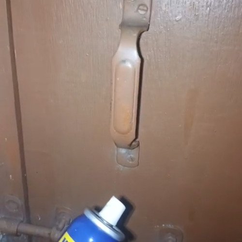 Wooden gate handle cleaning