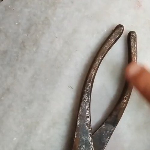 Dirty iron plier cleaning