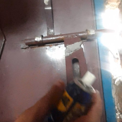 Iron gate lock cleaning