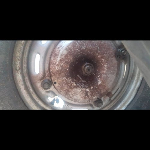 Dirty car rim cleaning