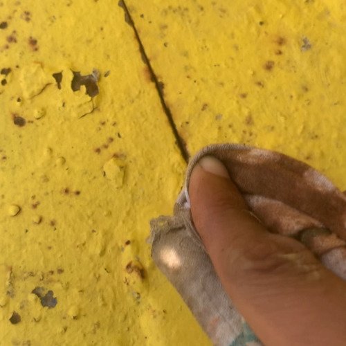 Rusted iron gate lock cleaning