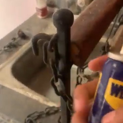 Clean the parts of iron by spray